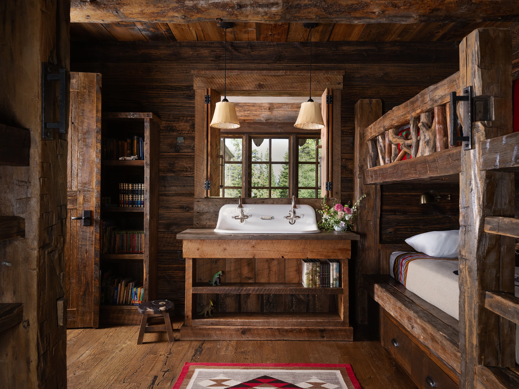 Bunk room with vintage wash-stand sink — interior design photography Big Sky Montana, Pearson Design Group